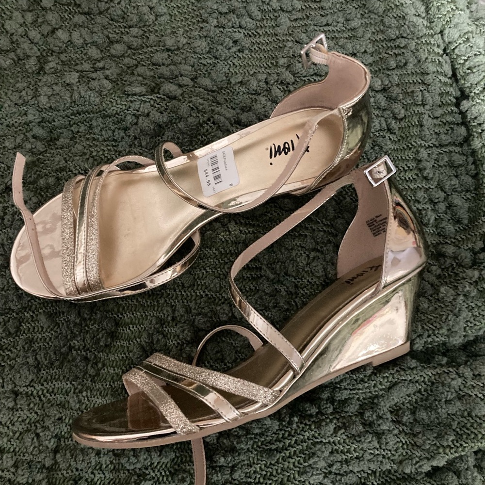 Nearly new gold wedge shoes. Ladies size 8